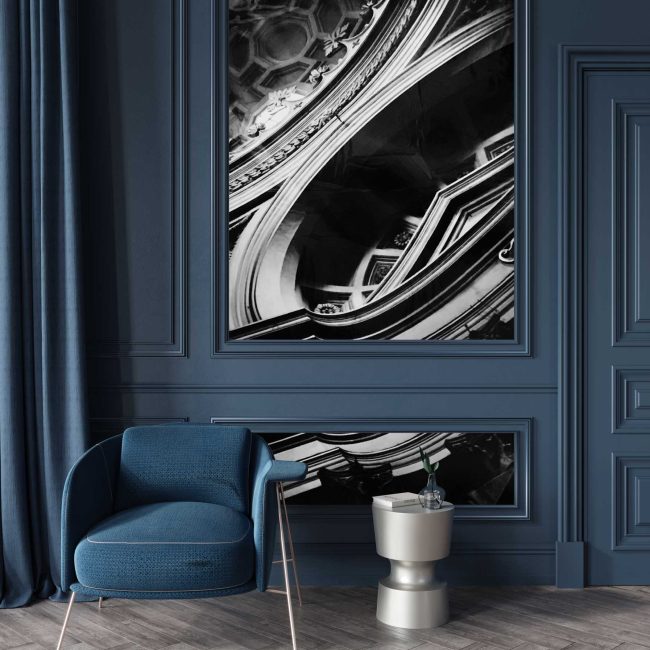 Classic interior in dark blue with an upholstered armchair and a metal table / 3D illustration, 3d render